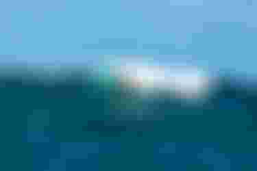 MariaBehrens riding a wave on SkyStyle SS26 and Unit26 on Guadeloupe