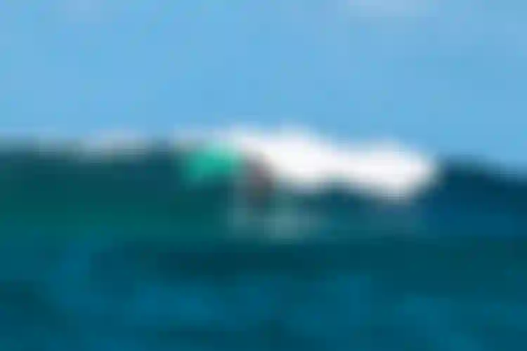 MariaBehrens riding a wave on SkyStyle SS26 and Unit26 on Guadeloupe
