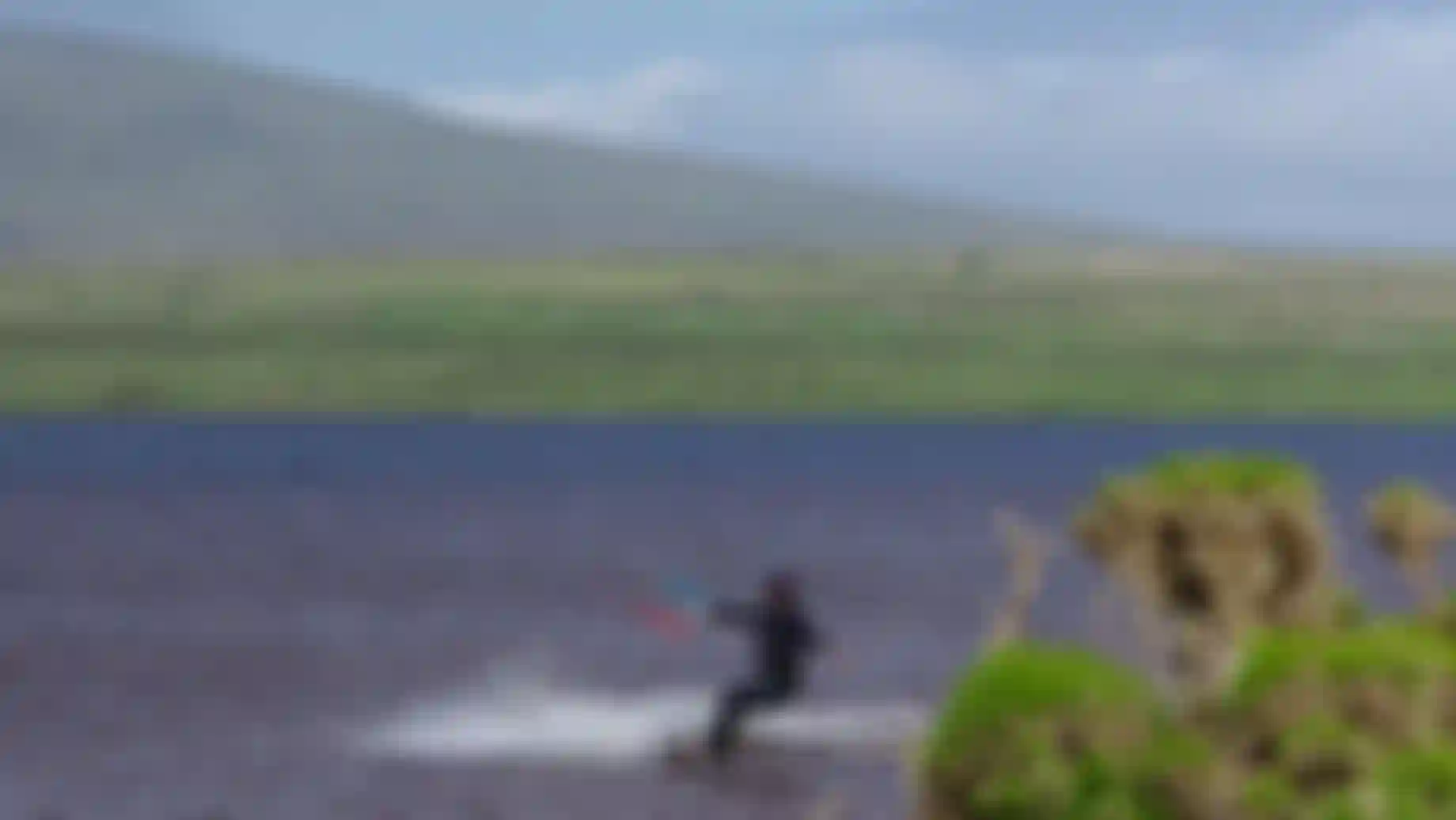 a man kitesurfing