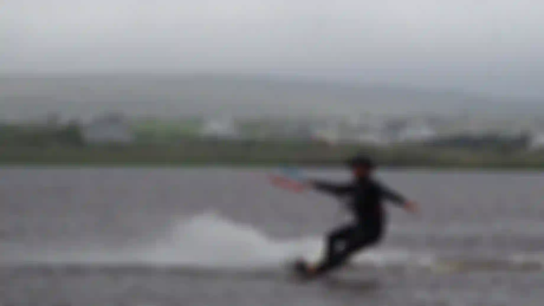 a man kiteboarding