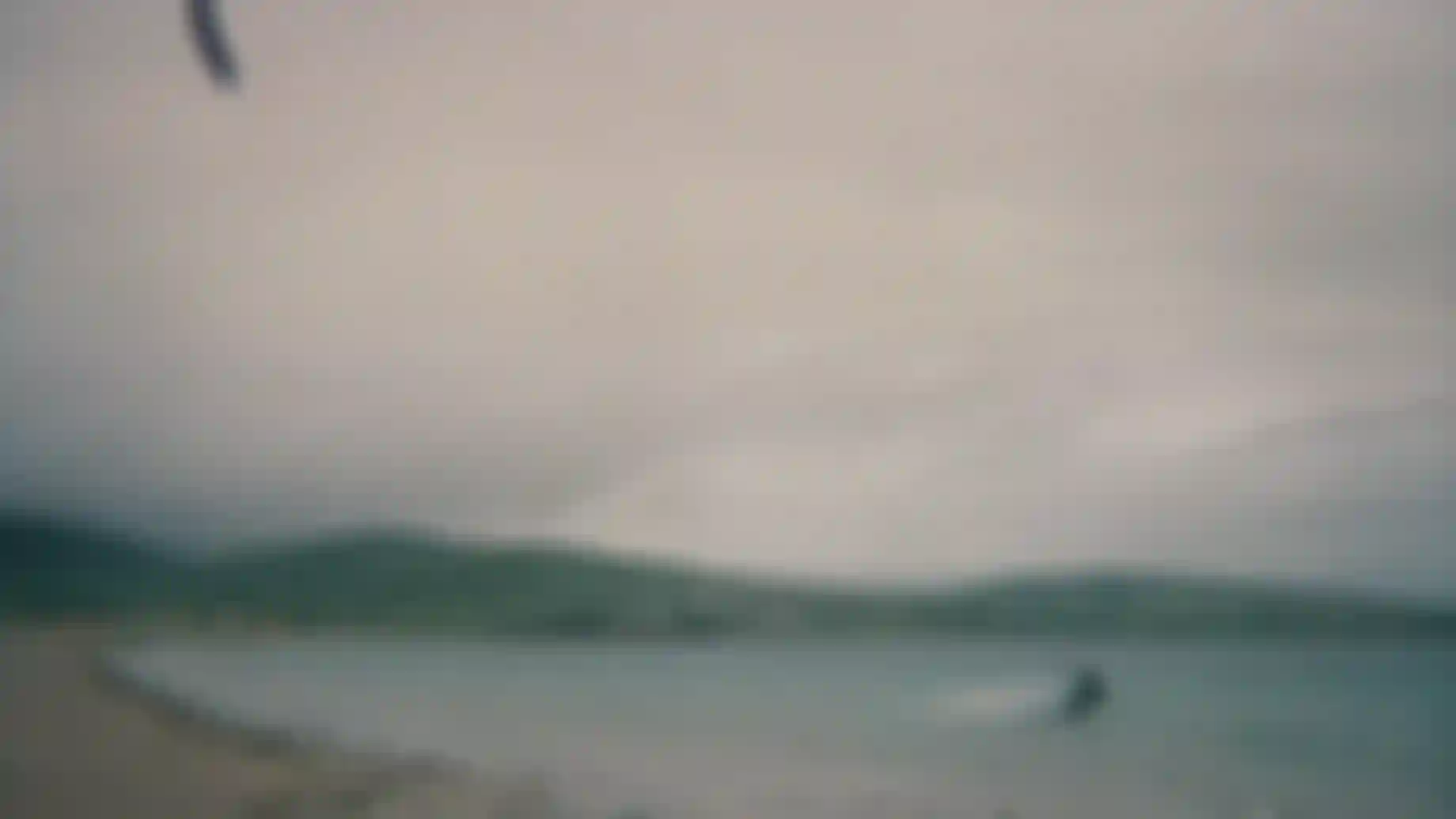 a man kiteboarding