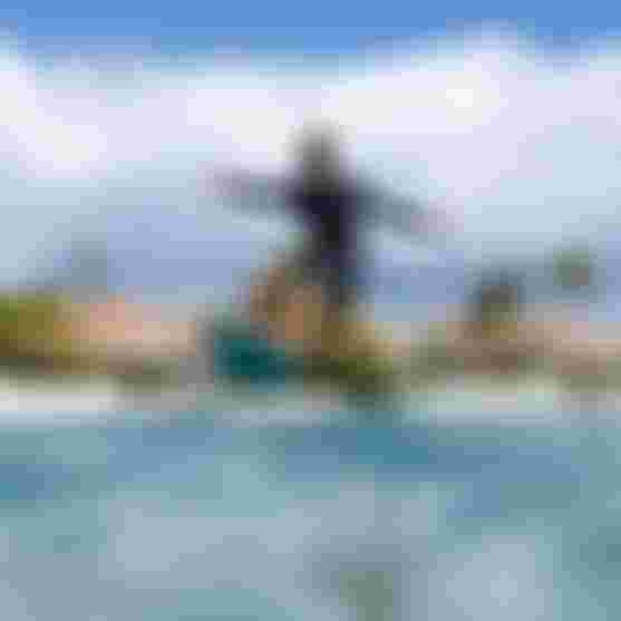 Finn Spencer foiling with the Foil Assist on flat water