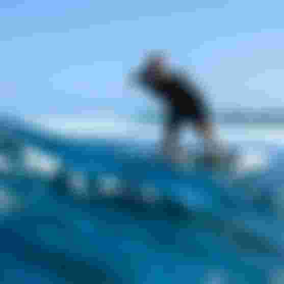 Leo Etienne foiling on a wave