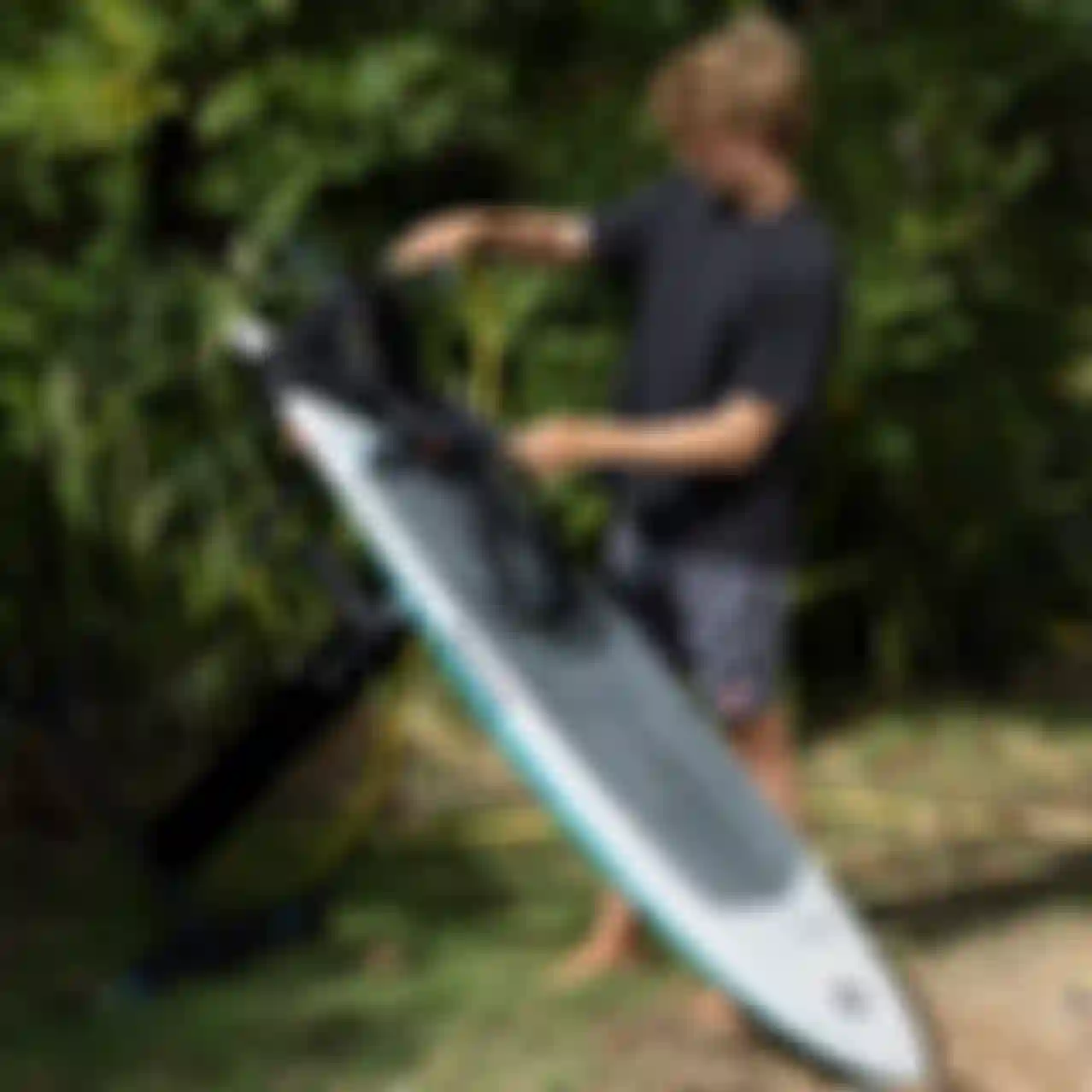 Person cleaning the Duotone Foil Assist Setup