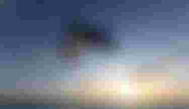 Freestyle Kitesurfer in the sunset with Duotone equipment