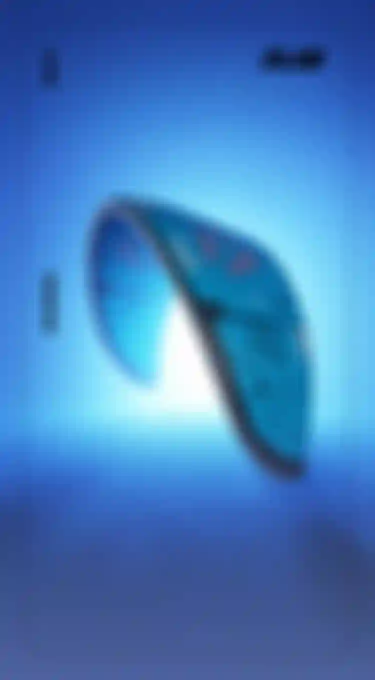 A blue Duotone kite with the text "Beyond Imagination" and "DLAB" in a blue setting, showcasing dynamic design and branding elements.