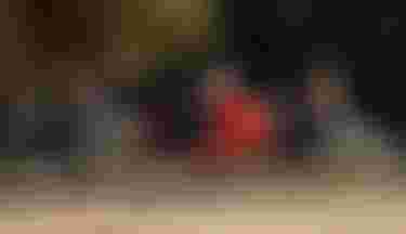 Duotone SUP Riders carrying SUP on the beach