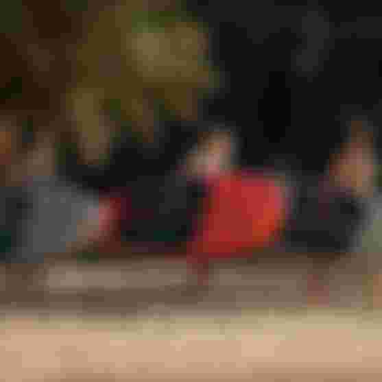 Duotone SUP Riders carrying SUP on the beach