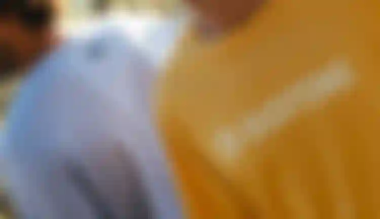 Gian-Maria wearing a yellow Duotone Shirt