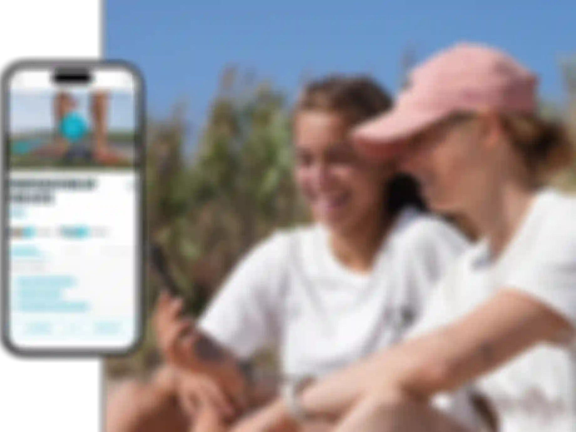 Two woman looking at a phone