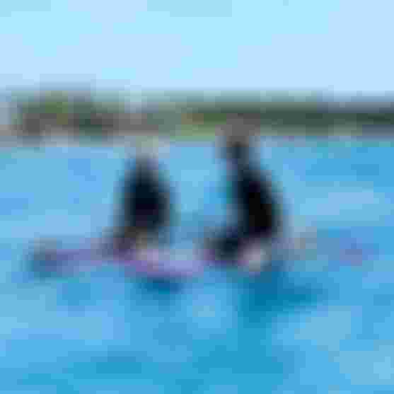 Finn and Jeffrey Spencer on Downwinder Slim SLS