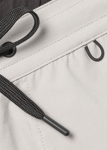 Elastic loop in waistband for sunglasses
