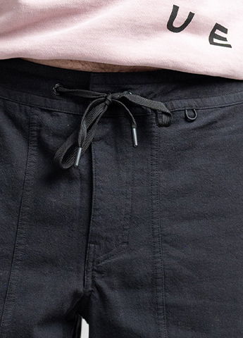 Elastic loop in waistband for sunglasses