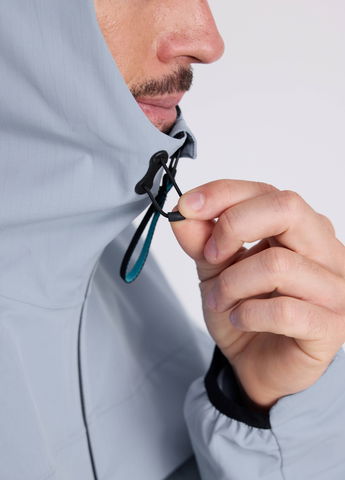 Adjustable elastic hood and hem for a tailored fit