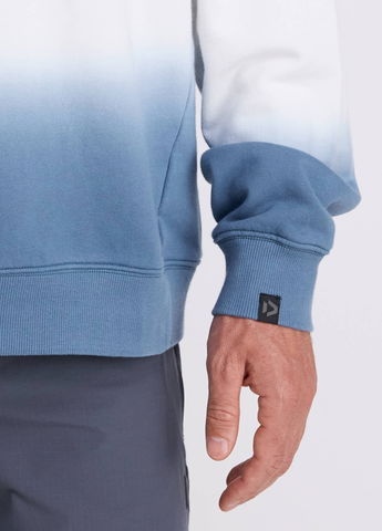 Poignets côtelés aux manches et à l’ourlet