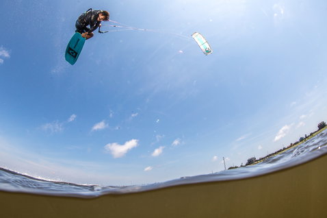 Duotone Vegas 2021 LEI kite during kitesurfing on flat coastal ocean water