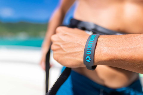 Duotone Wristband wristbands during kitesurfing at an ocean beach