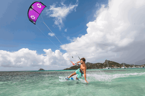 Duotone Mono LEI kite during kitesurfing in the tropical ocean lagoon at Union Island, Caribbean