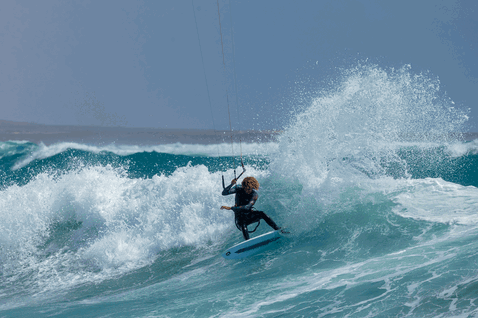 Duotone Fish SLS kite surfboard during kitesurfing in the ocean