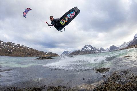 Duotone Jaime SLS twin-tip kiteboard during kitesurfing in a Norwegian mountain fjord