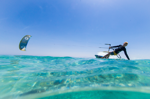 Duotone Shred twin-tip kiteboard during kitesurfing in tropical ocean