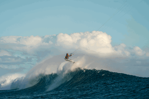 Duotone Session SLS wave kiteboard during wave riding at an open ocean surf break