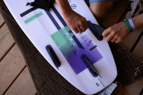 Duotone Slash SLS kite surfboard 4'4" in white, purple, mint green and navy blue