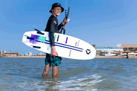 Duotone Slash SLS kite surfboard 4'4" during kitesurfing at the ocean beach