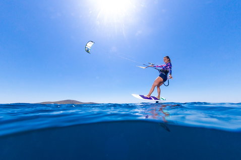 Duotone Hybrid SLS 2024 SLS directional kiteboard during kitesurfing on the open ocean