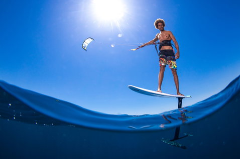 Duotone Hybrid SLS kite surfboard during foiling on the open ocean