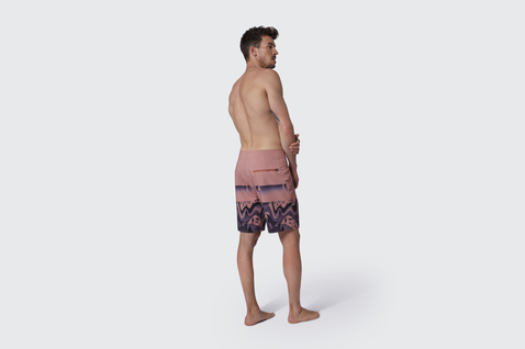 Duotone boardshorts in rosa antico, blu navy scuro e malva in studio