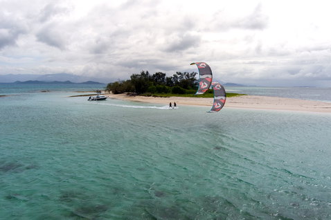 Duotone Evo D/LAB LEI kite during kitesurfing at a tropical island lagoon in New Caledonia