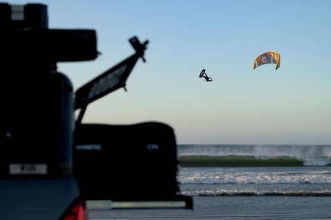 Duotone Evo D/LAB LEI kite during kitesurfing on the ocean beach