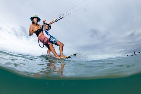 Duotone Ultraspike twin-tip kiteboard during kitesurfing in a tropical ocean lagoon in New Caledonia