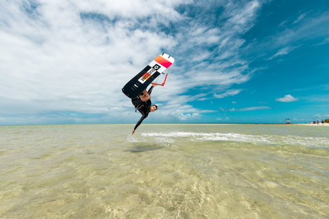 Duotone Ultraspike twin-tip kiteboard during kitesurfing in the lagoon of New Caledonia