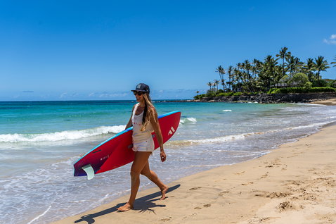 Duotone FreeWave windsurf board during wave riding on the beach of Maui, Hawaii