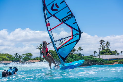 Duotone FreeWave windsurf board during wave riding at the tropical ocean coast