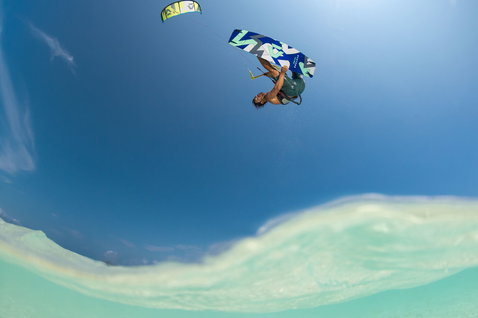 Duotone Jaime SLS twin-tip kiteboard during kitesurfing in a tropical ocean lagoon