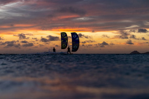 Duotone Jaime twin-tip kiteboard during kitesurfing at the ocean beach
