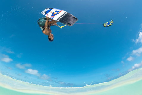 Duotone Select SLS twin-tip kiteboard during kitesurfing in tropical shallow turquoise water