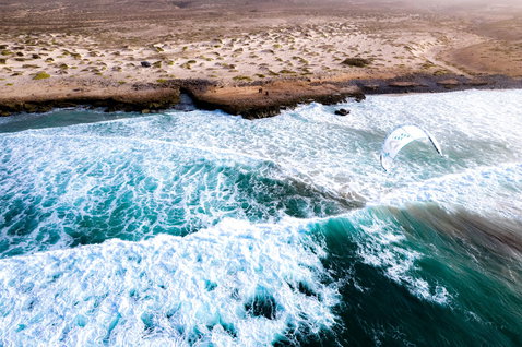 Duotone Neo Concept Blue LEI kite during kitesurfing on the coastline of Cape Verde