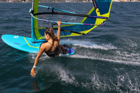 Duotone Eagle SLS windsurf board during windsurfing in an open ocean bay