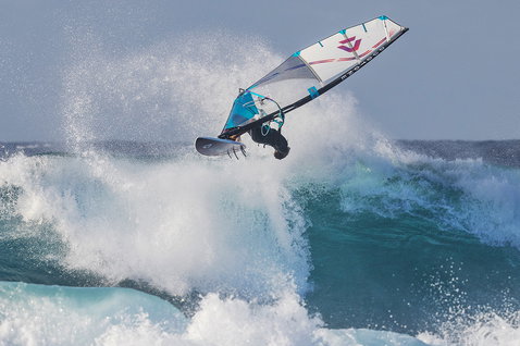 Duotone Super Hero D/LAB wave sail during wave riding on the ocean