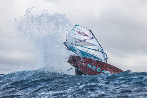 Duotone Grip 3 D/LAB windsurf board during wave riding on open sea