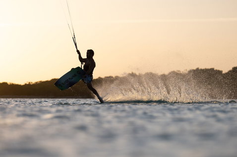 Duotone Jaime Concept Blue twin-tip kiteboard during kitesurfing on a flat water lagoon