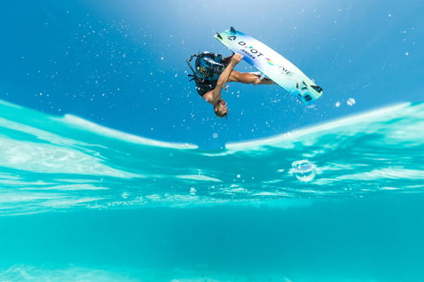 Duotone Jaime Concept Blue twin-tip kiteboard during kitesurfing in a tropical ocean