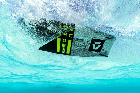 Duotone Select Concept Blue twin-tip kiteboard during kitesurfing in tropical ocean waters