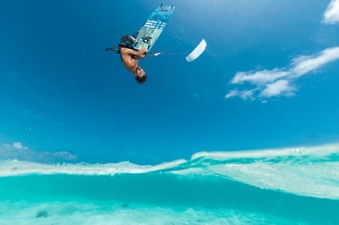 Duotone Select SLS 2025 twin-tip kiteboard during kitesurfing in the tropical ocean lagoon