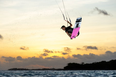 Duotone Soleil Concept Blue twin-tip kiteboard during kitesurfing at a tropical island coastline