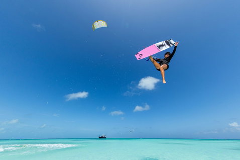 Duotone Soleil Concept Blue twin-tip kiteboard during kitesurfing at a tropical ocean beach